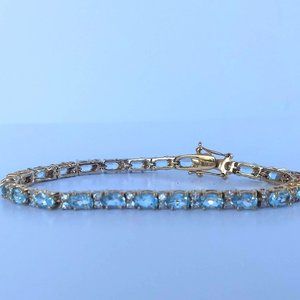 Gold Tone Aquarmarine and Crystal Tennis Bracelet
